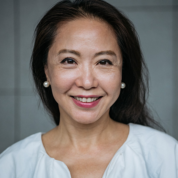 Happy woman smiling showing her teeth