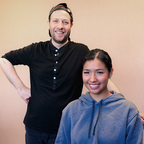 Happy patient and doctor from Minnesota Dental Surgery and Implant Center smiling