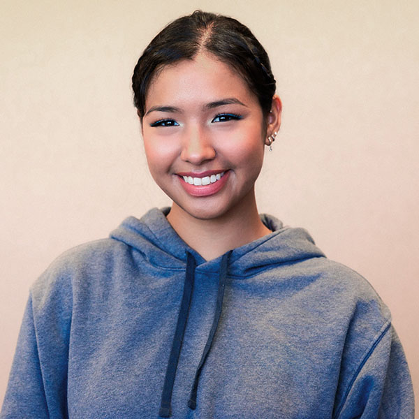 Happy patient smiling showing her teeth in Minnesota Dental Surgery and Implant Center